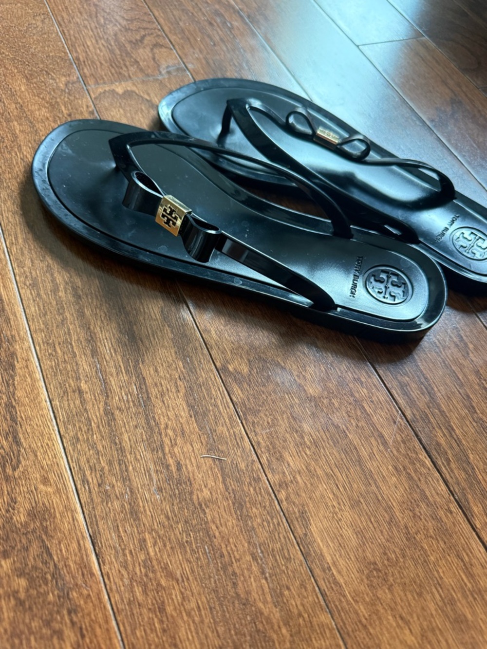 Tory Burch Black Jelly Bow Flip Flops with Gold Logo Accent - Picture 2 of 10